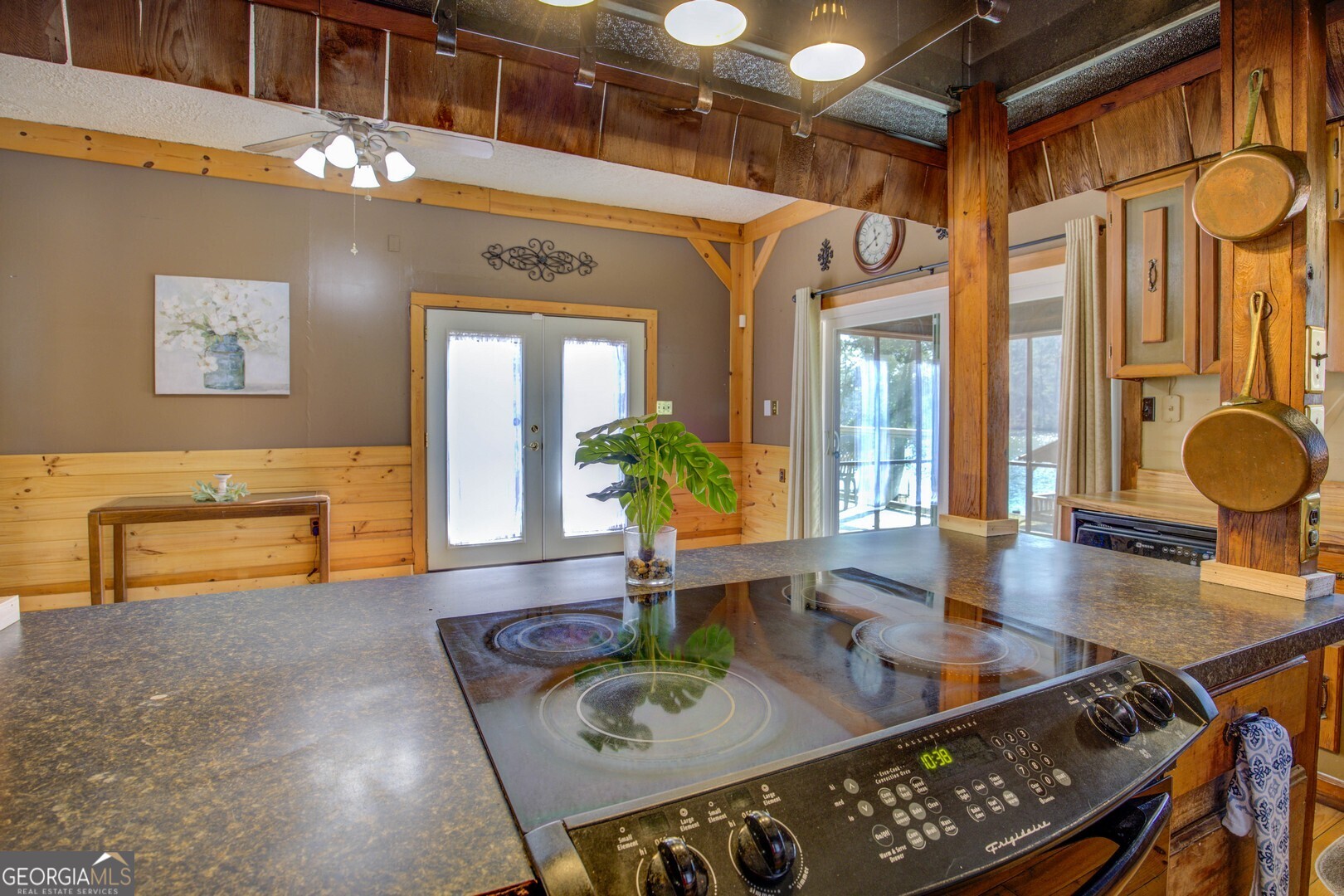 162 Collins Road Jackson, GA 30233 - Photo 29 of 77 a view of a dining room with furniture and a chandelier