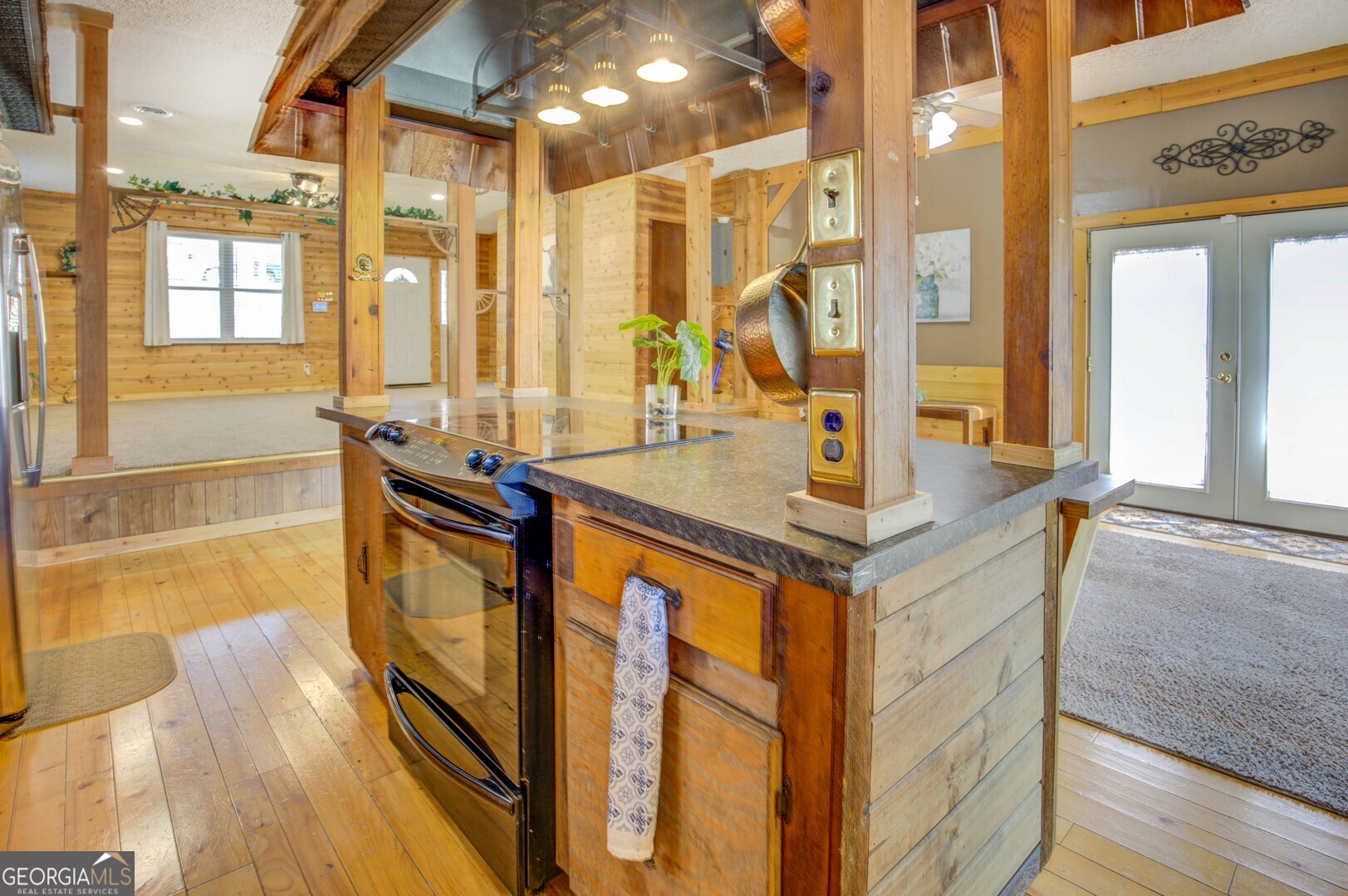 162 Collins Road Jackson, GA 30233 - Photo 30 of 77 a kitchen with stainless steel appliances granite countertop a sink and a cabinets