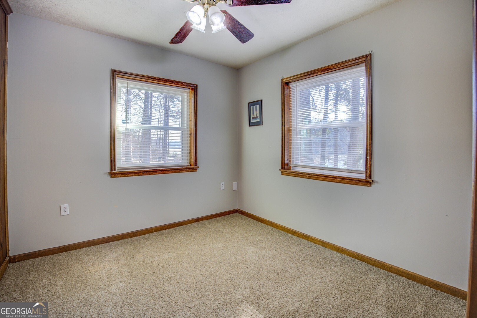 162 Collins Road Jackson, GA 30233 - Photo 43 of 77 a view of an empty room with a window