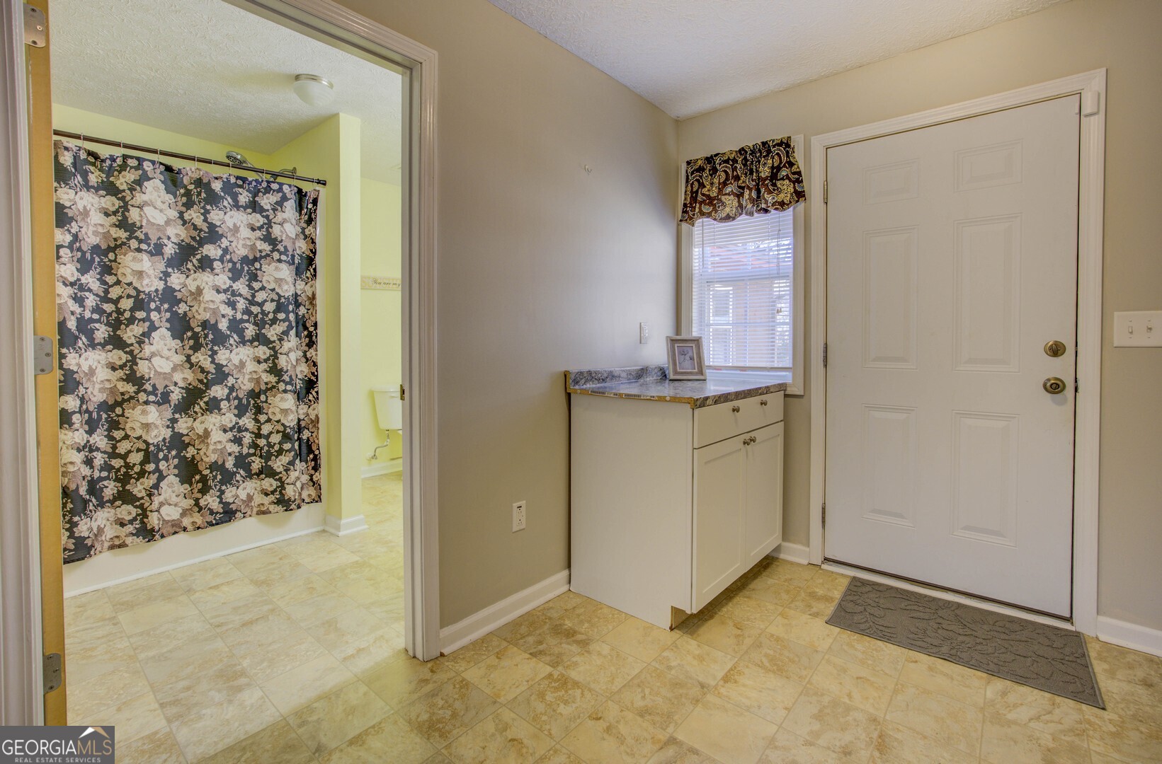 162 Collins Road Jackson, GA 30233 - Photo 53 of 77 a view of a utility room with closet and a window