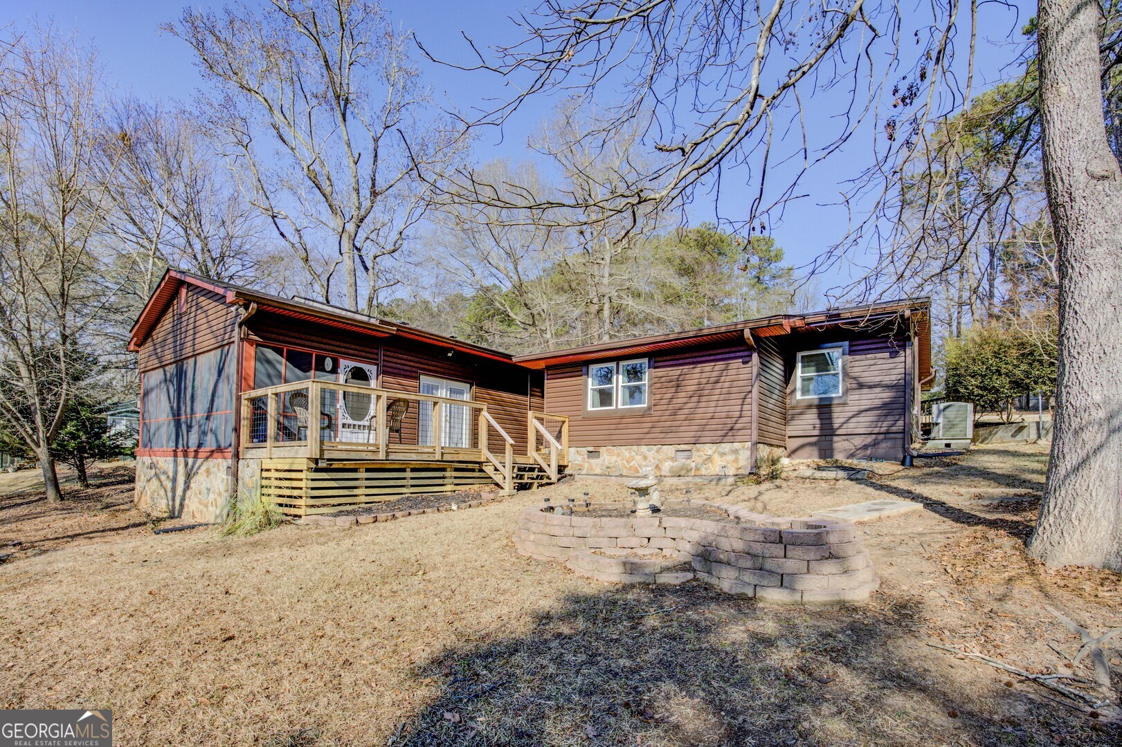 162 Collins Road Jackson, GA 30233 - Photo 59 of 77 a house with a large tree in front of it