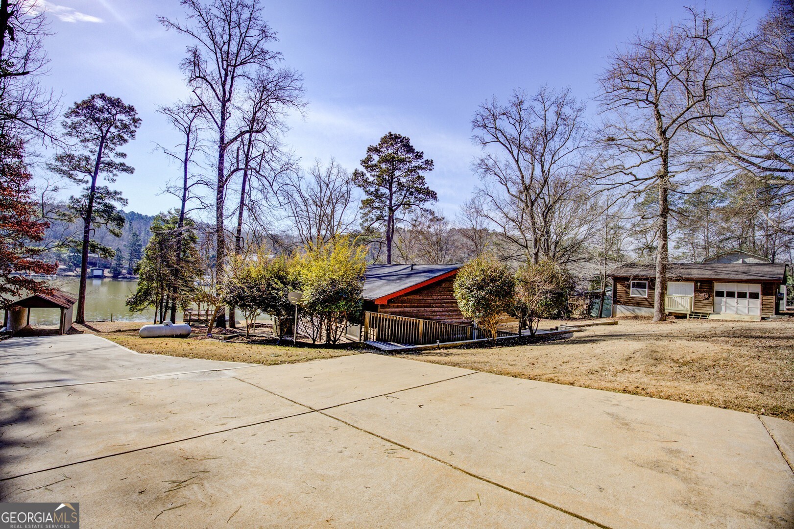 162 Collins Road Jackson, GA 30233 - Photo 64 of 77 a view of a yard with a tree
