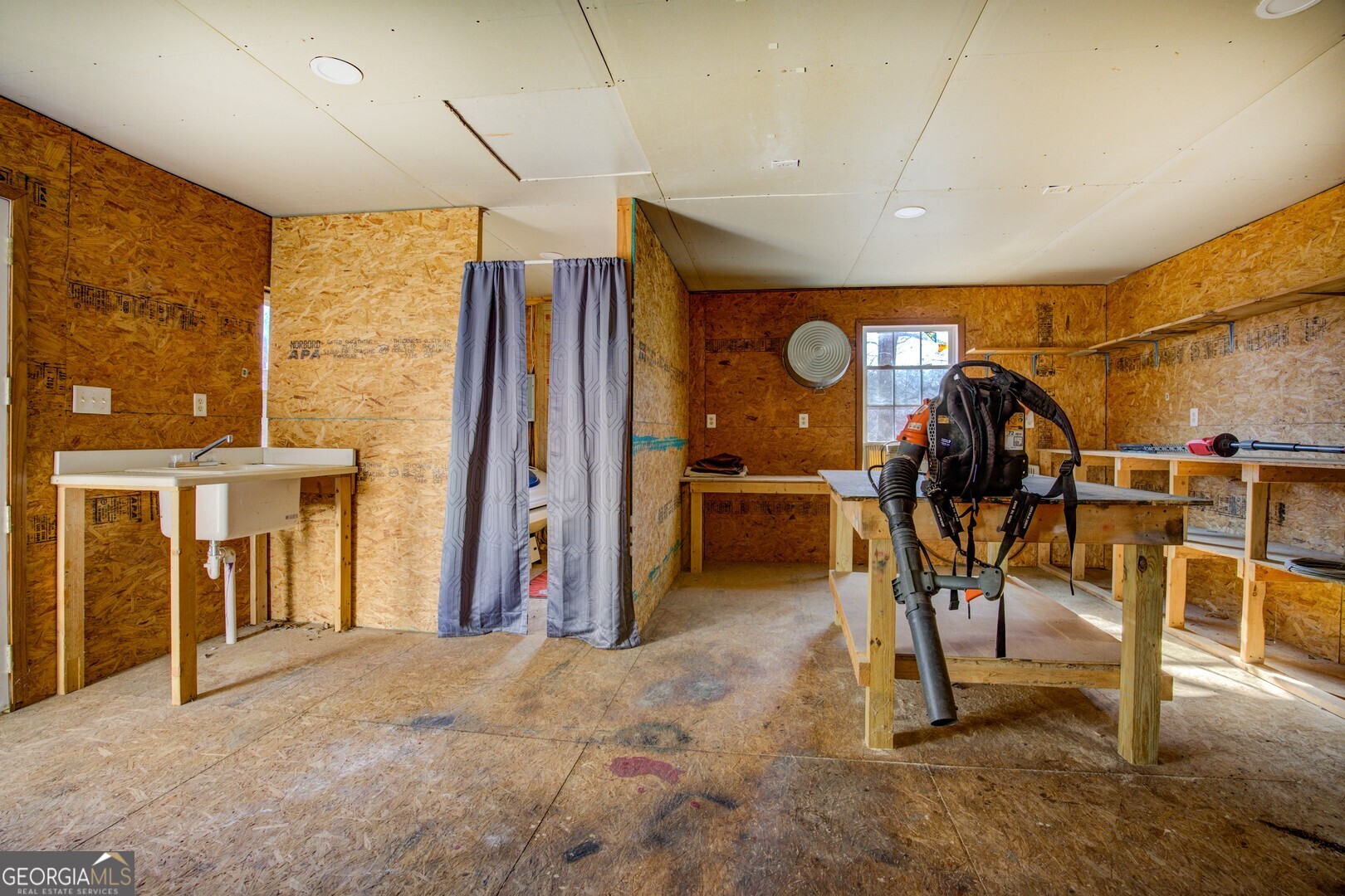 162 Collins Road Jackson, GA 30233 - Photo 69 of 77 a view of a room with gym equipment