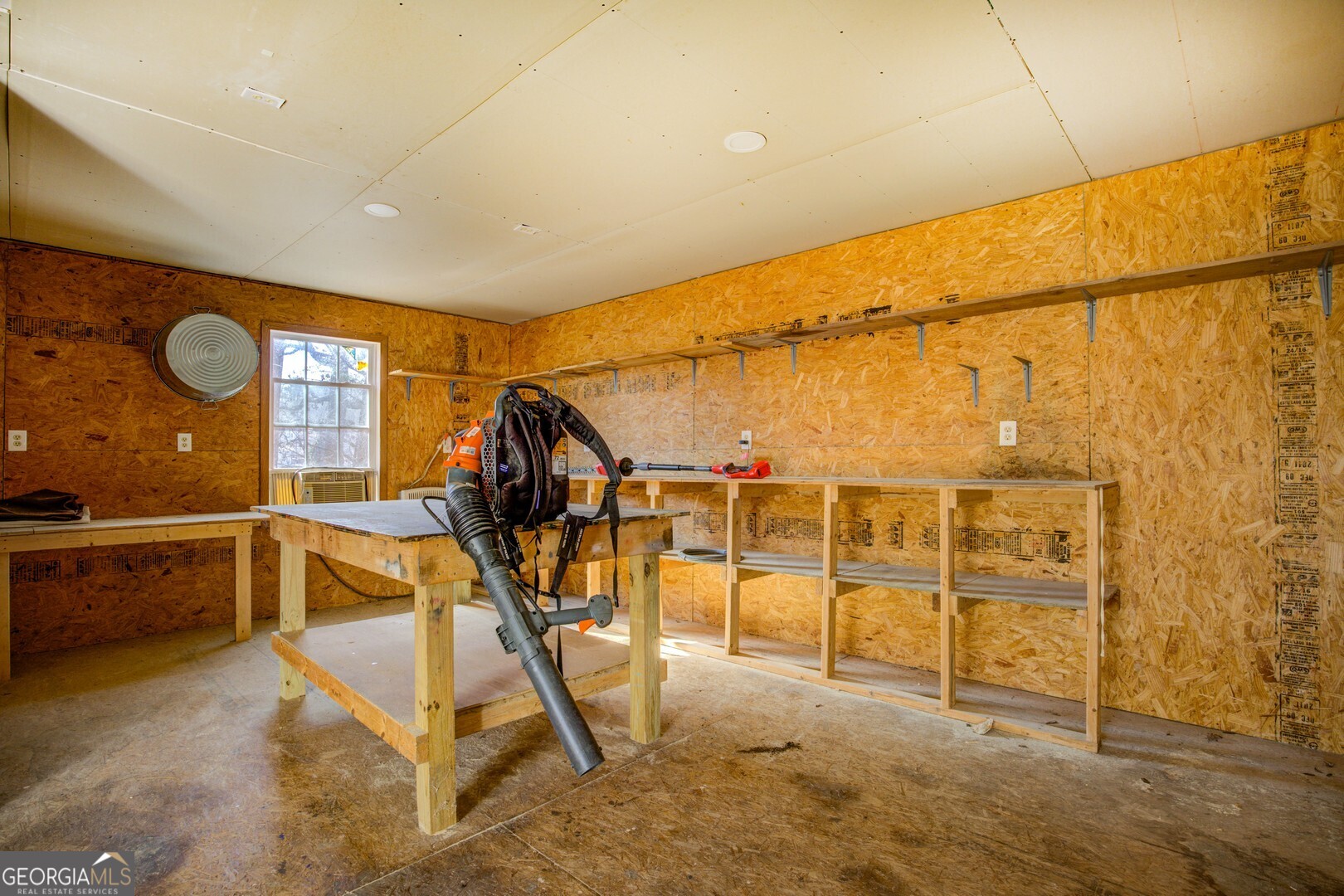 162 Collins Road Jackson, GA 30233 - Photo 70 of 77 a view of a room with gym equipment