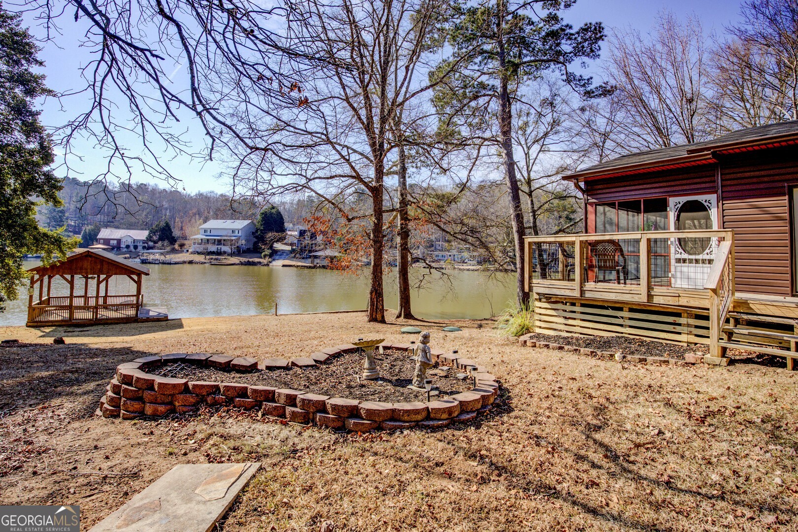 162 Collins Road Jackson, GA 30233 - Photo 75 of 77 a front view of a house with lake view