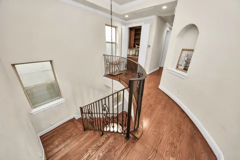a view of entryway with wooden floor