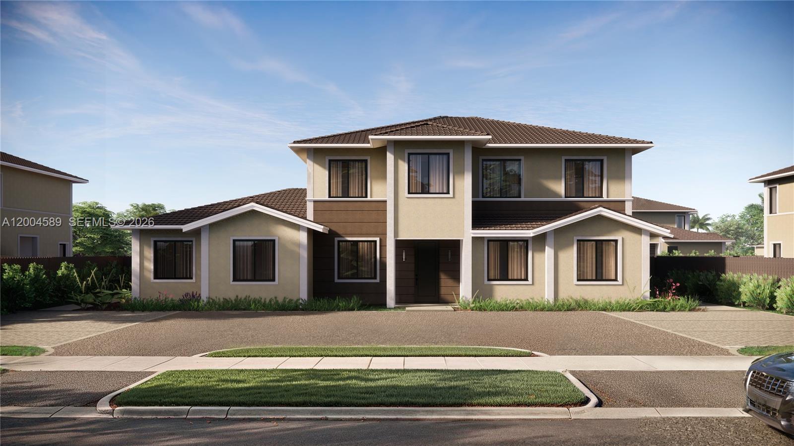 a front view of a house with a yard