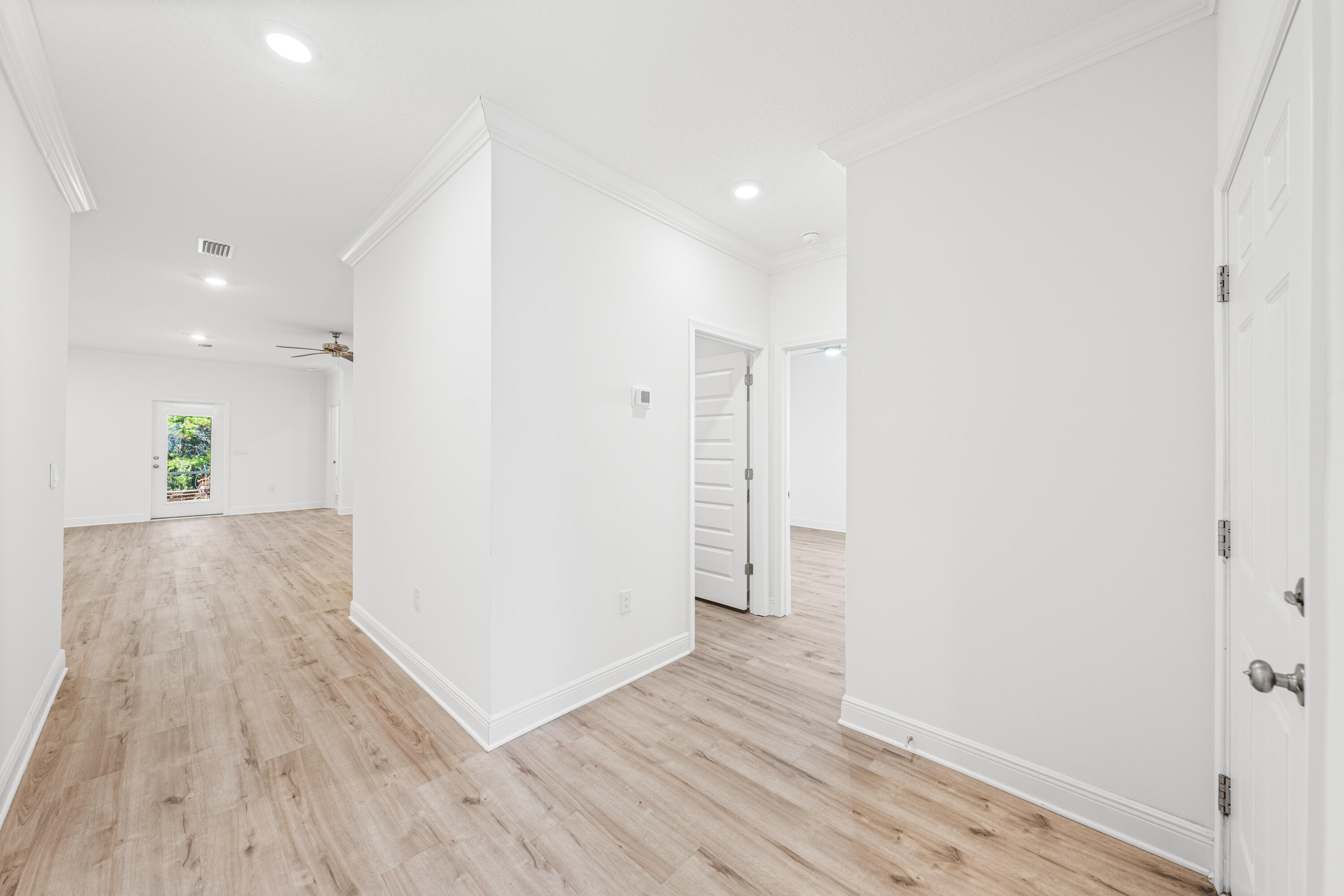 157 Jr's Way Santa Rosa Beach, FL 32459 - Photo 17 of 45 a view of hallway with wooden floor