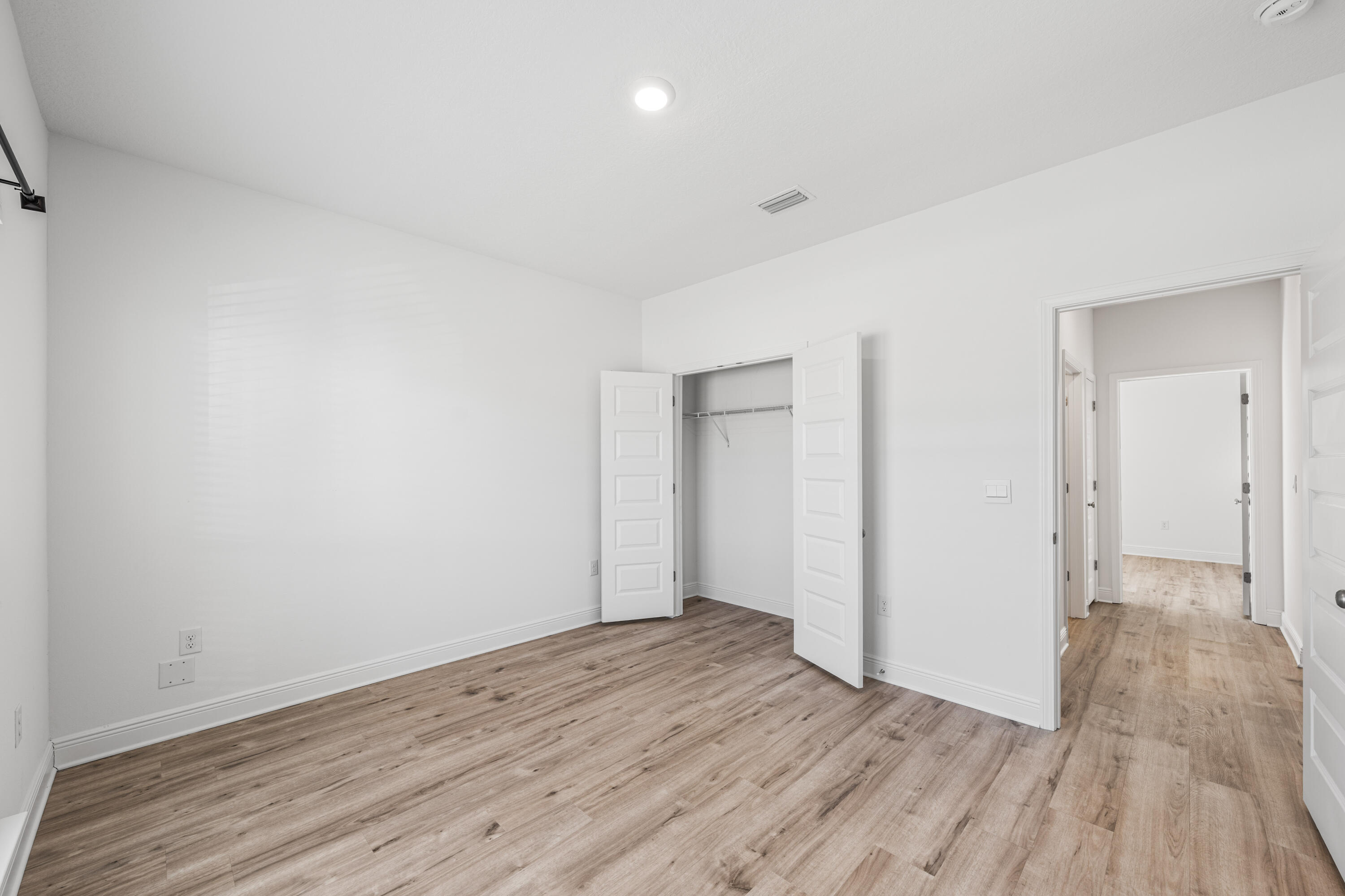 157 Jr's Way Santa Rosa Beach, FL 32459 - Photo 19 of 45 wooden floor in an empty room