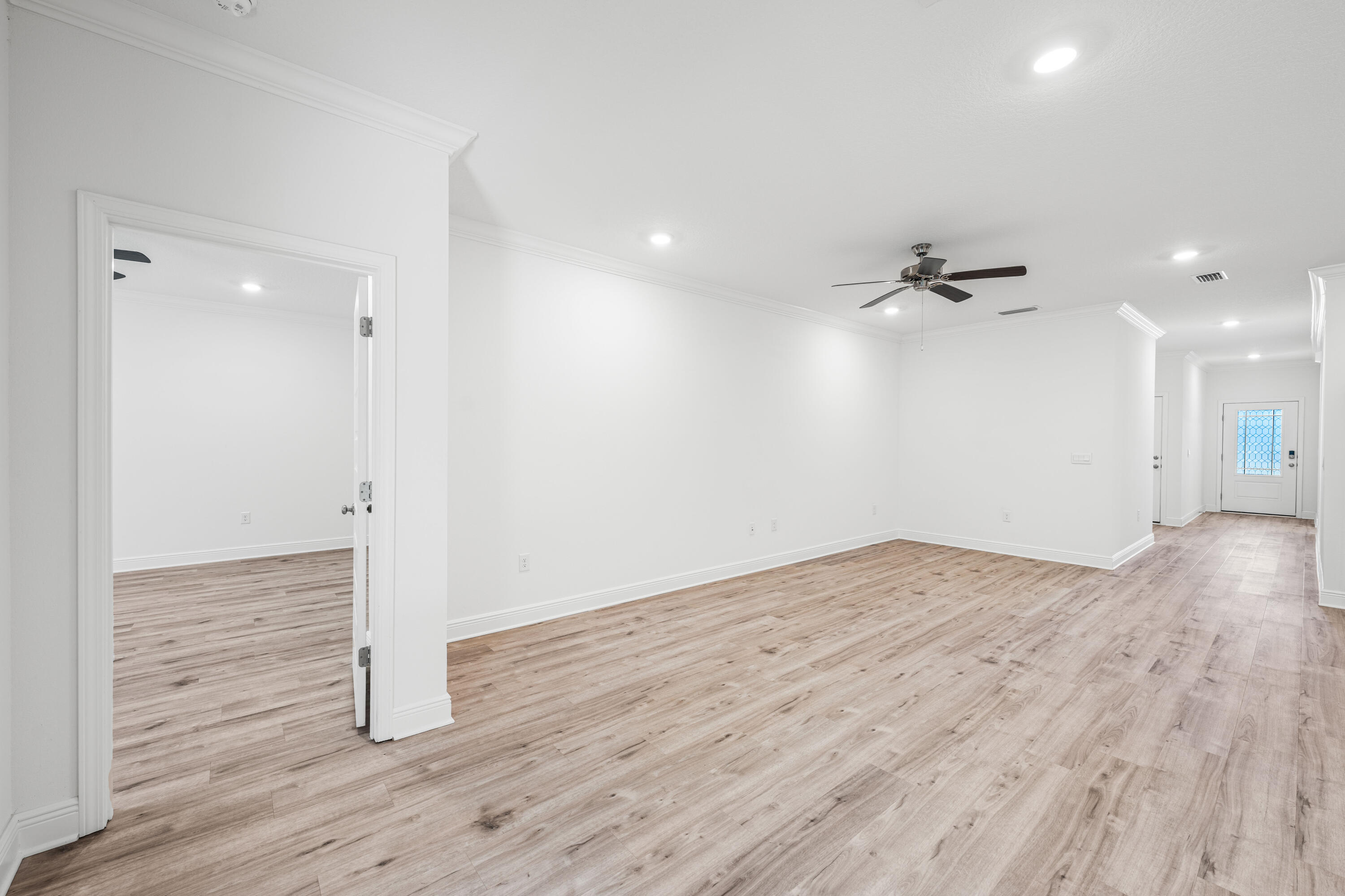 157 Jr's Way Santa Rosa Beach, FL 32459 - Photo 26 of 45 a view of empty room with wooden floor