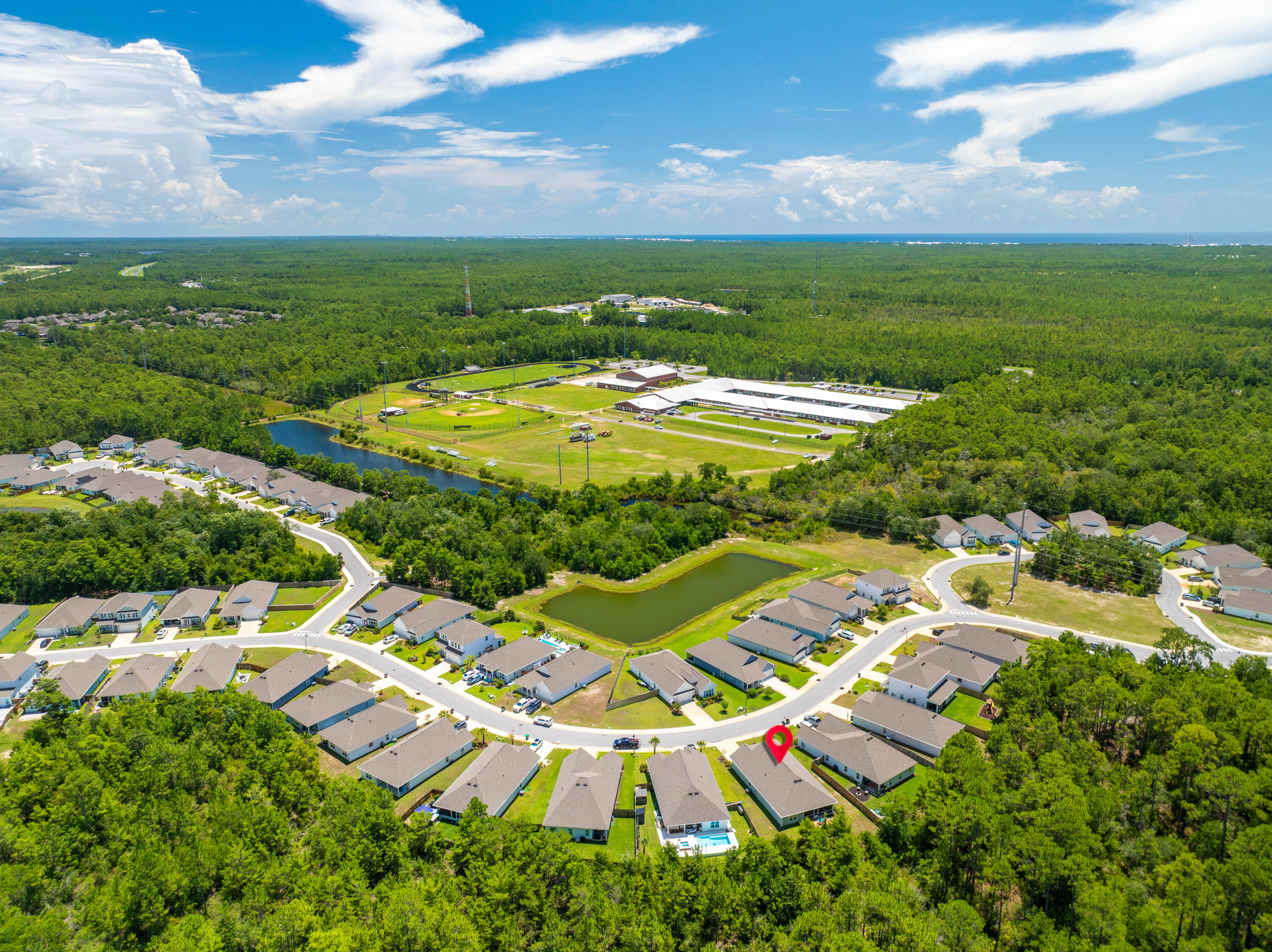 157 Jr's Way Santa Rosa Beach, FL 32459 - Photo 45 of 45 an aerial view of residential houses with outdoor space