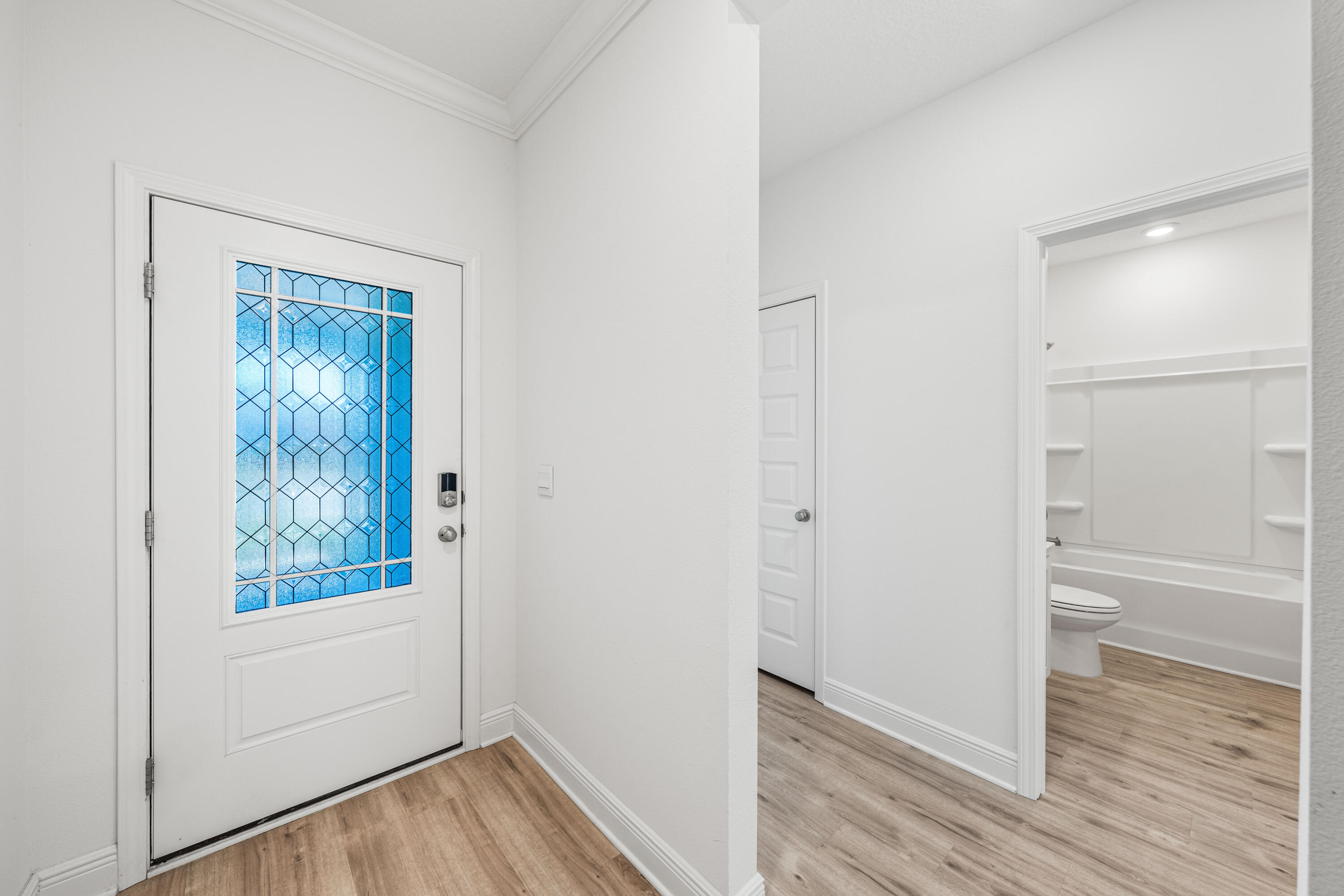 157 Jr's Way Santa Rosa Beach, FL 32459 - Photo 6 of 45 a view of bathroom with a wooden floor and a window