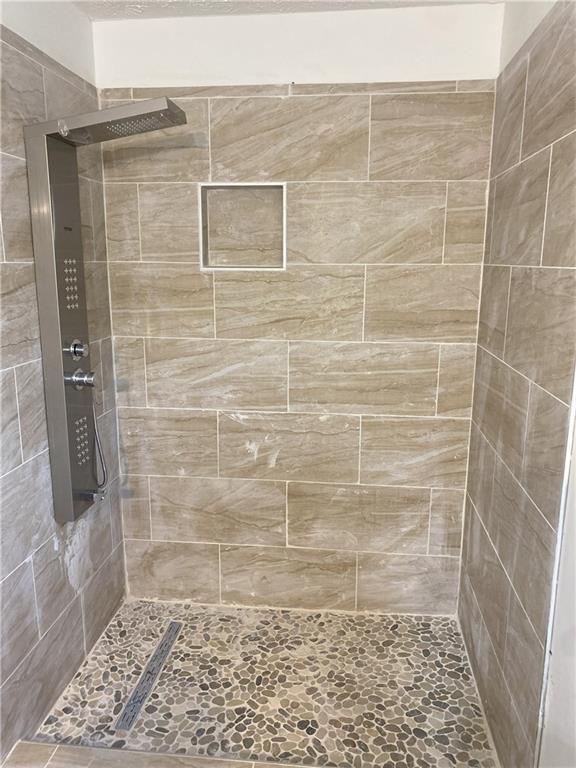 Undisclosed Address Decatur, GA 30034 - Photo 11 of 19 a bathroom with a shower