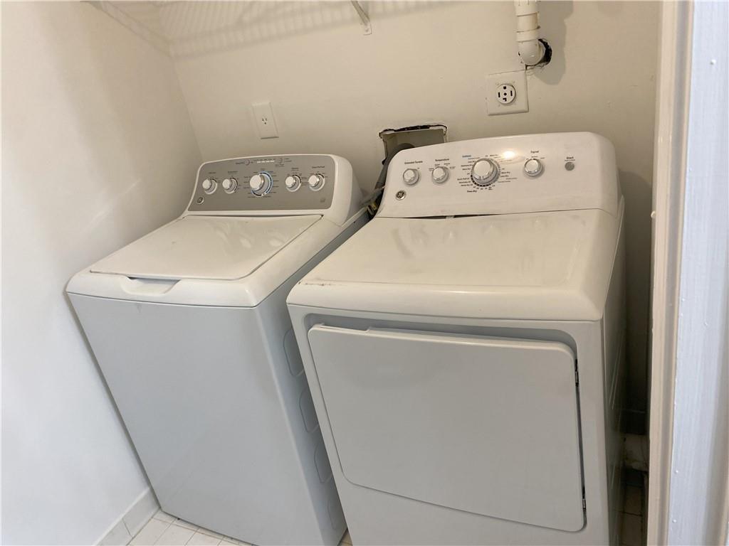 Undisclosed Address Decatur, GA 30034 - Photo 13 of 19 a utility room with dryer and washer