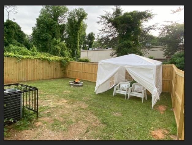 Undisclosed Address Decatur, GA 30034 - Photo 15 of 19 a backyard of a house with table and chairs