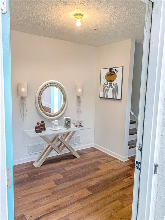 Undisclosed Address Decatur, GA 30034 - Photo 3 of 19 a view of a kitchen with wooden floor