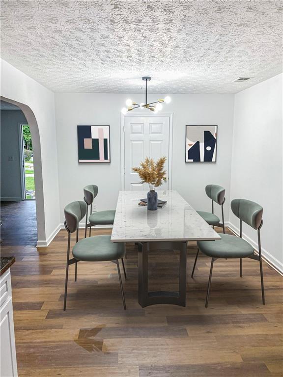 Undisclosed Address Decatur, GA 30034 - Photo 5 of 19 a view of a dining room with furniture window and wooden floor