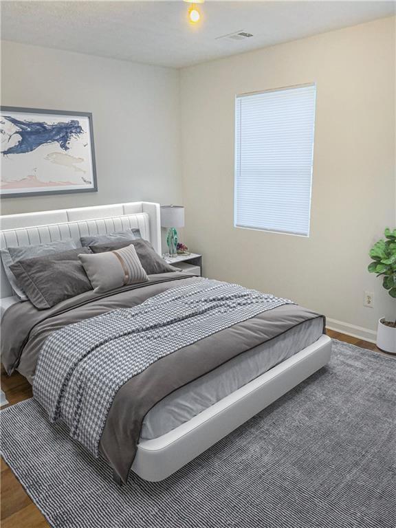 Undisclosed Address Decatur, GA 30034 - Photo 10 of 19 a bedroom with a bed and a window