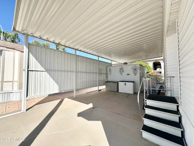 a view of a hallway with seating space