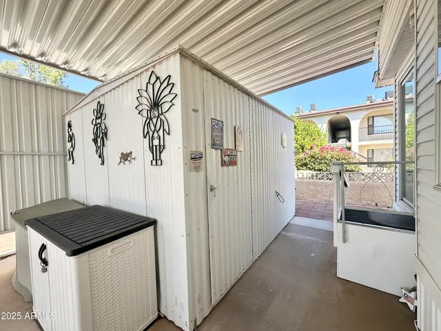 a view of a living room and a balcony