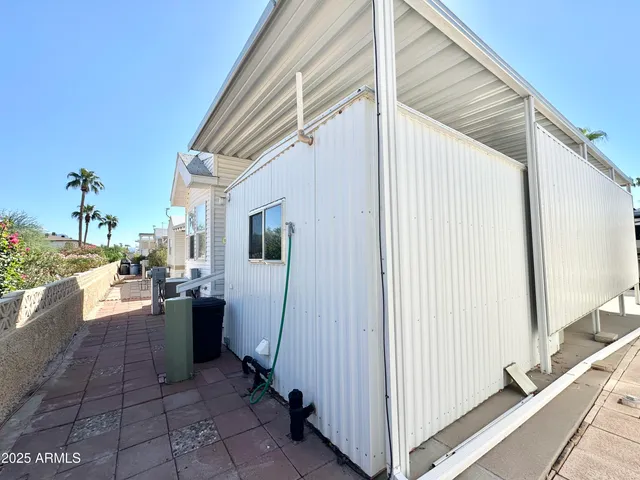 a view of a porch with seating space