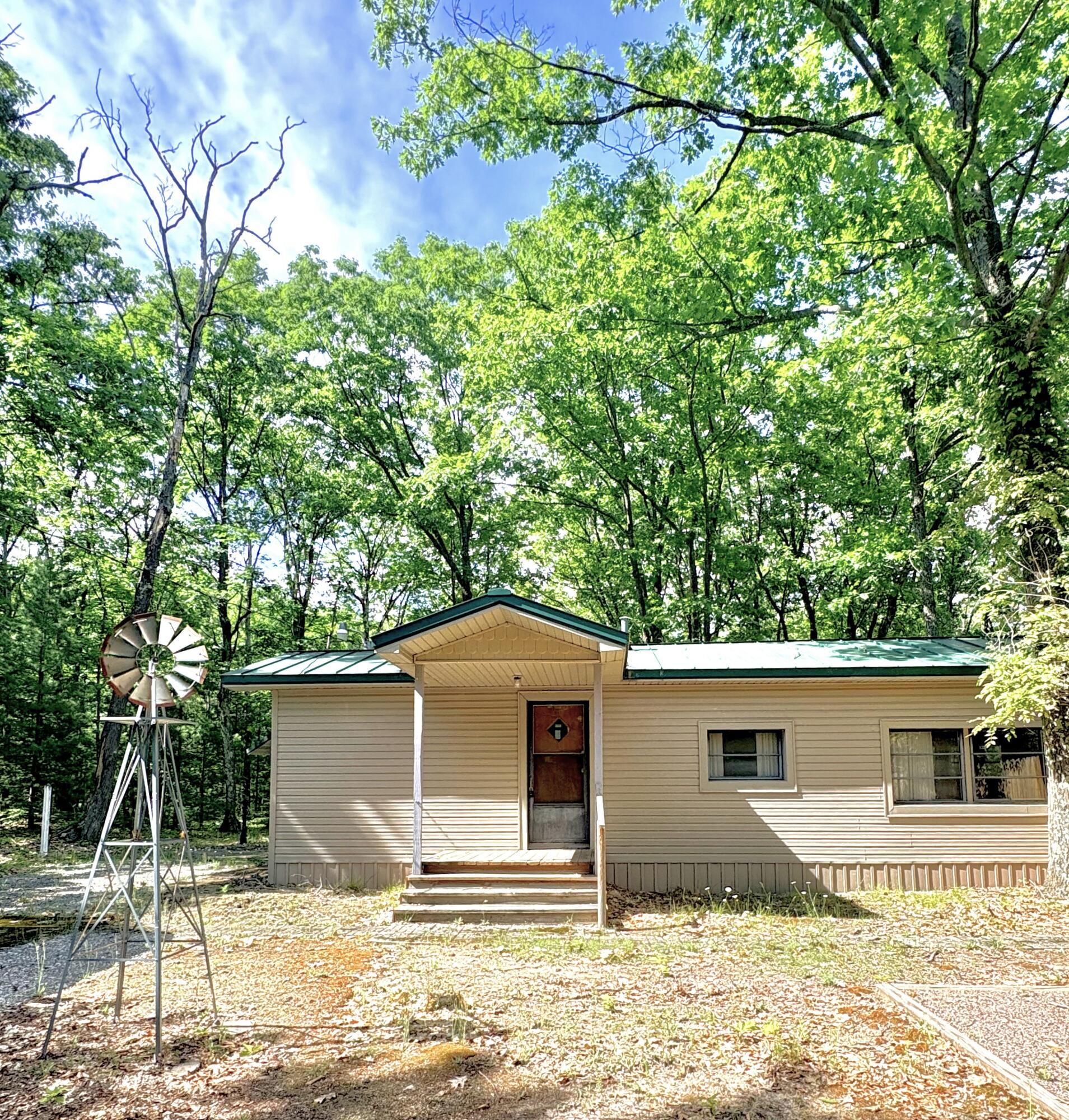 10322 East 40th Street Reed City, MI 49677 - Photo 1 of 12 Front