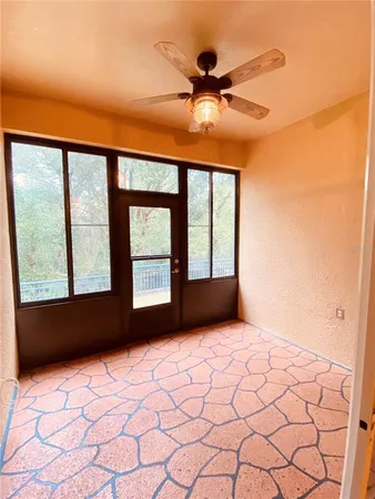 a view of an empty room and window