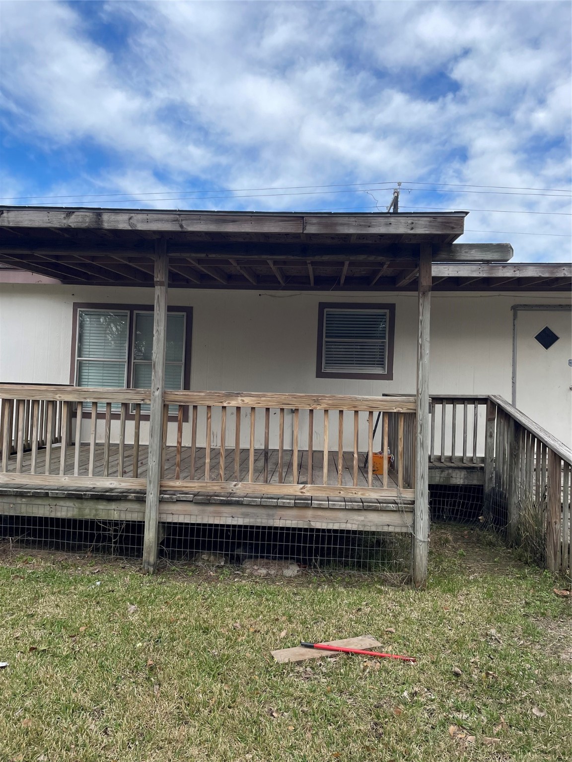 10312 Farm To Market Road 457 Bay City, TX 77414 - Photo 16 of 16 a view of a house with wooden deck and ocean view
