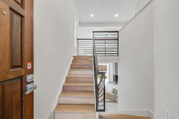 a view of entryway with wooden floor