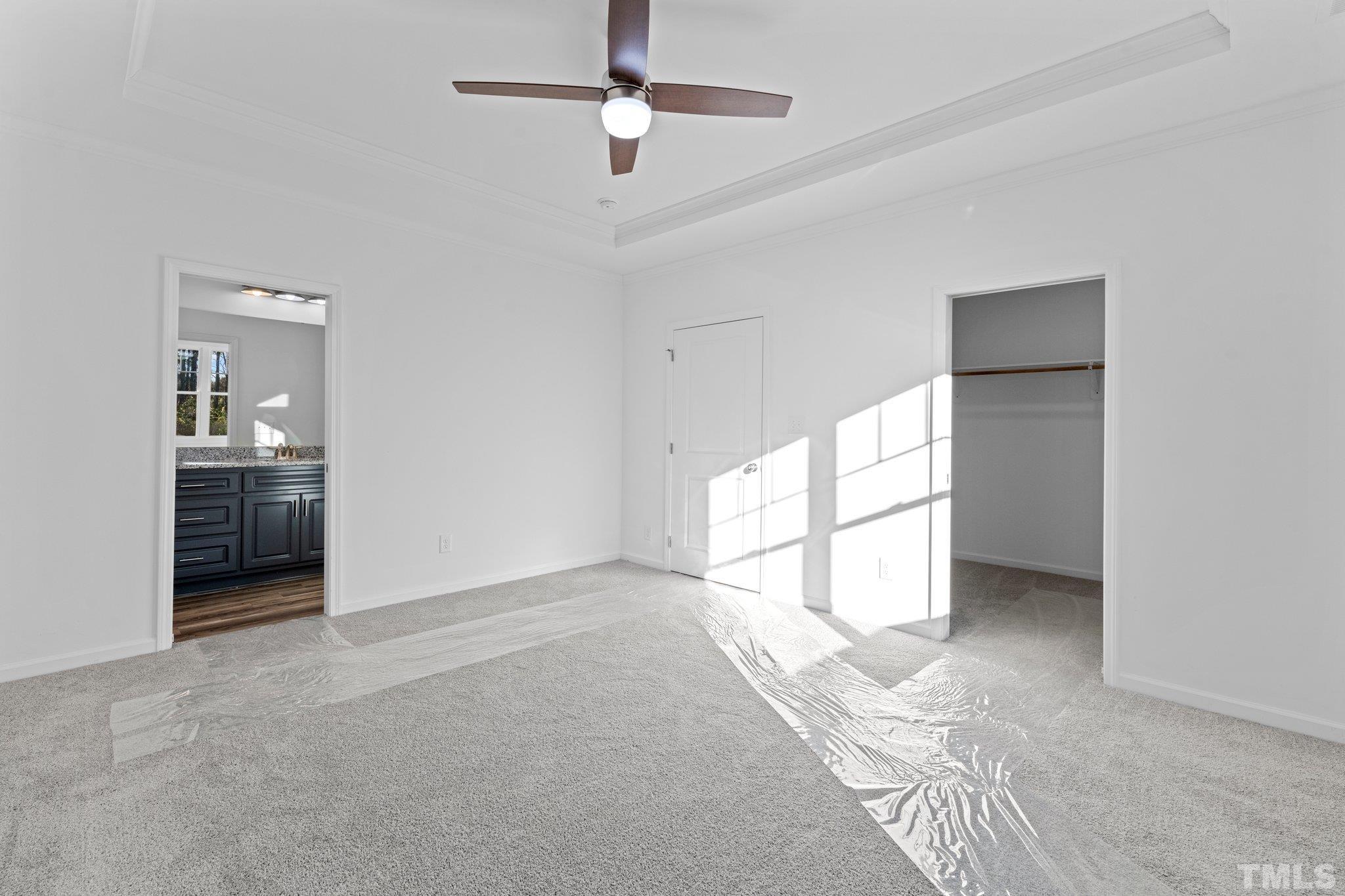 9771 Chapman Road Bailey, NC 27807 - Photo 16 of 35 an empty room with windows and cabinet