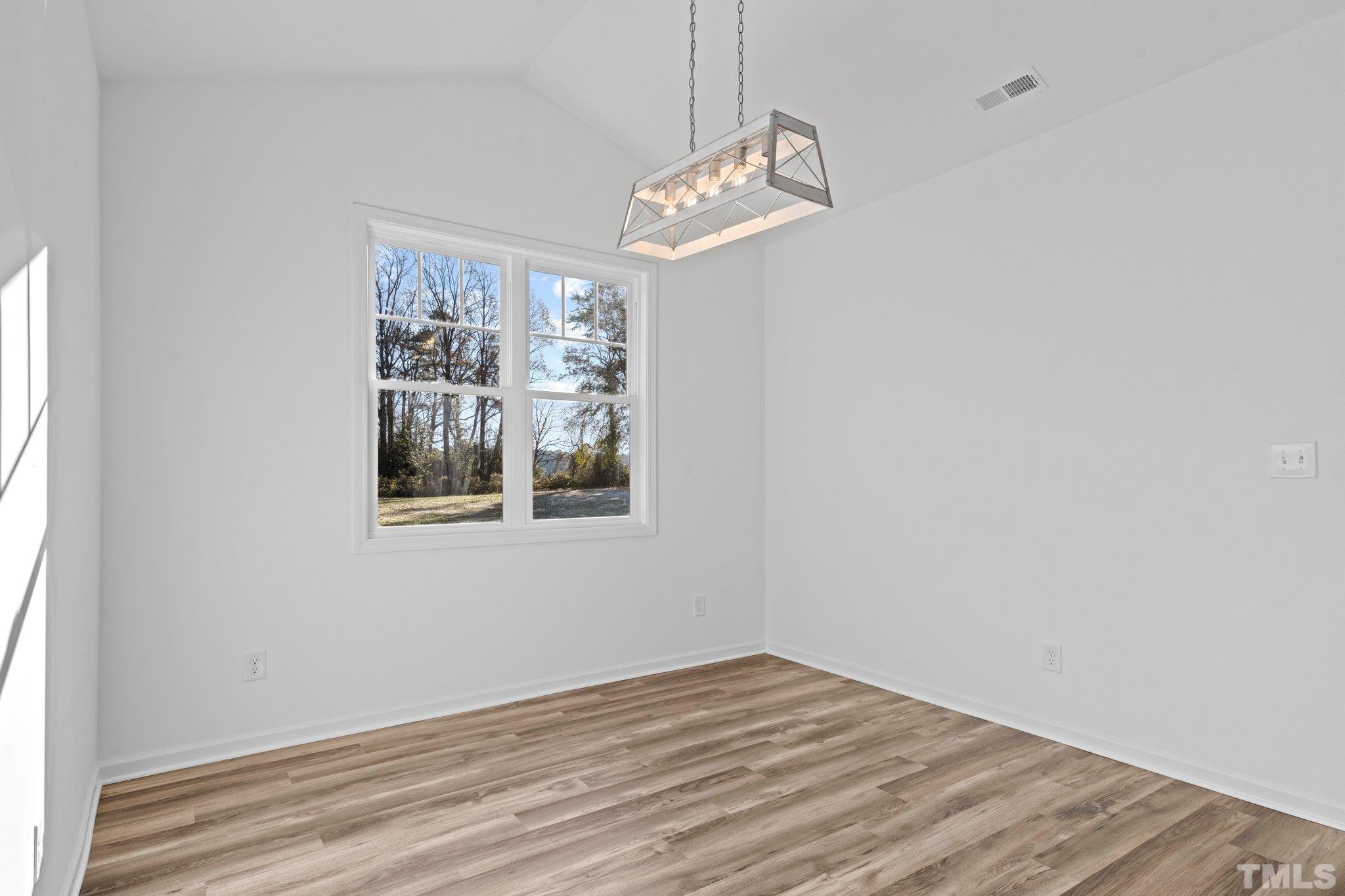 9771 Chapman Road Bailey, NC 27807 - Photo 20 of 35 a view of livingroom with window