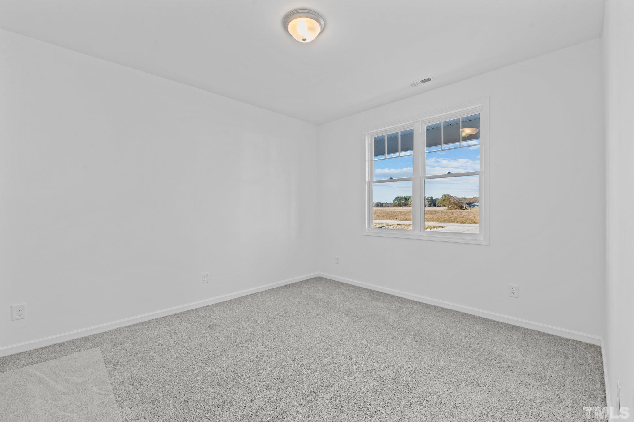 9771 Chapman Road Bailey, NC 27807 - Photo 22 of 35 a view of an empty room