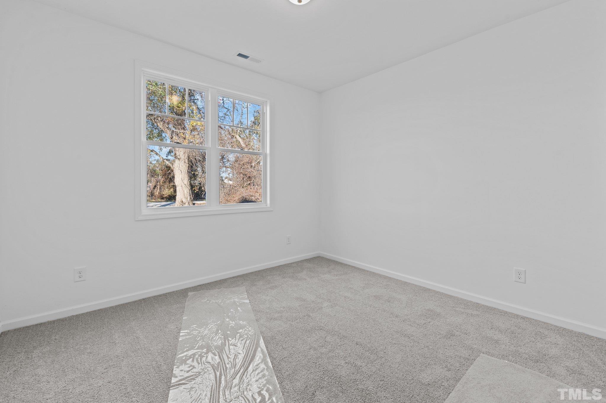 9771 Chapman Road Bailey, NC 27807 - Photo 26 of 35 an empty room with windows