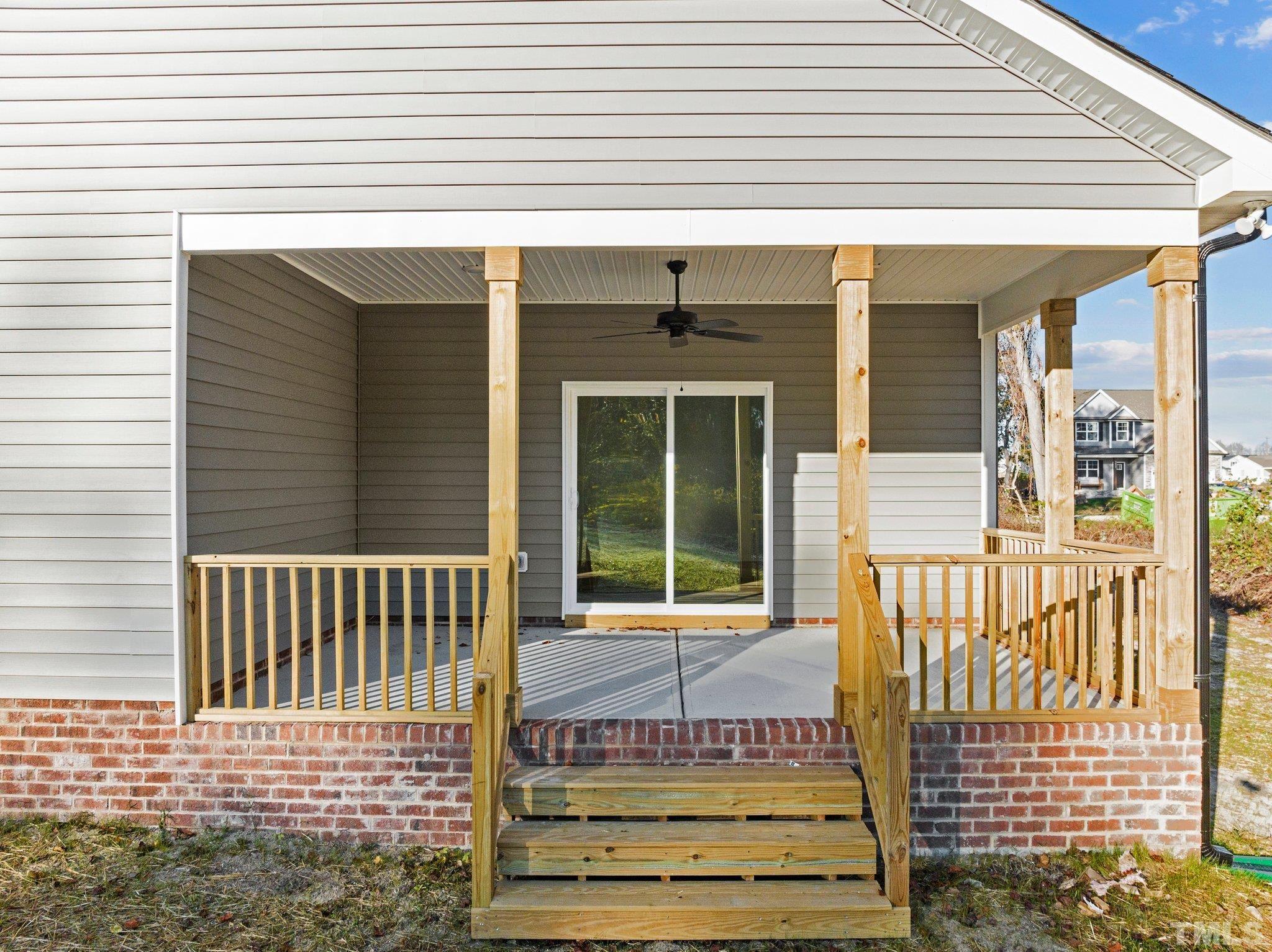 9771 Chapman Road Bailey, NC 27807 - Photo 30 of 35 a front view of a house with a porch
