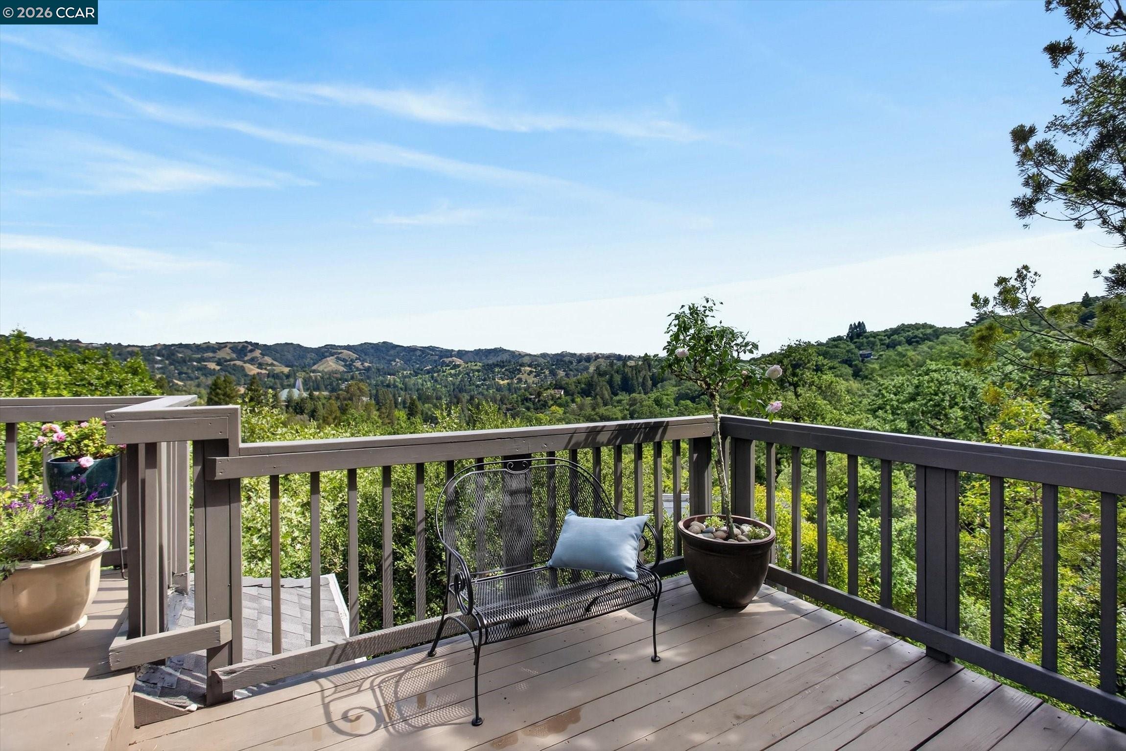 4105 Coralee Lane Lafayette, CA 94549 - Photo 8 of 43 a view of a balcony with two chairs and a table