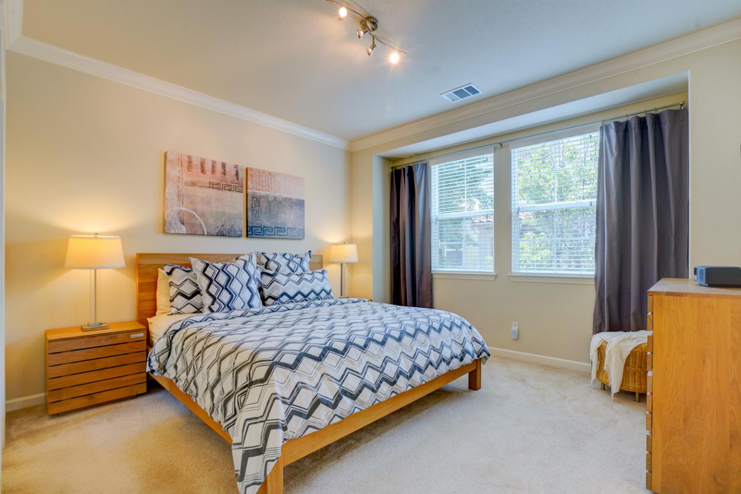 5236 Fioli Loop San Ramon, CA 94582 - Photo 23 of 40 a bedroom with a bed and wooden floor