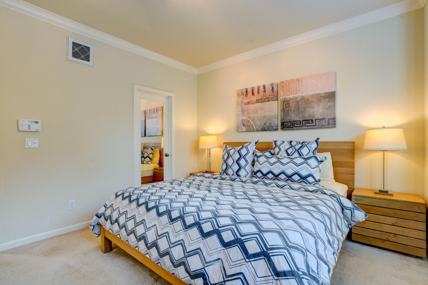 5236 Fioli Loop San Ramon, CA 94582 - Photo 24 of 40 a bedroom with a bed and lamp
