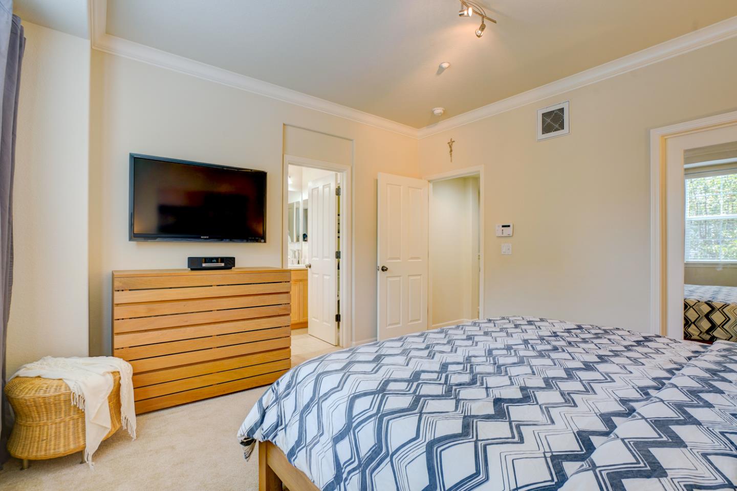 5236 Fioli Loop San Ramon, CA 94582 - Photo 25 of 40 a bedroom with a bed and a flat screen tv
