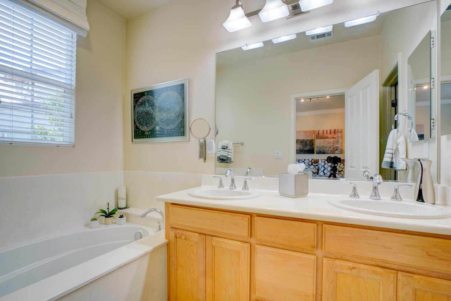 5236 Fioli Loop San Ramon, CA 94582 - Photo 26 of 40 a bathroom with a tub sink and mirror