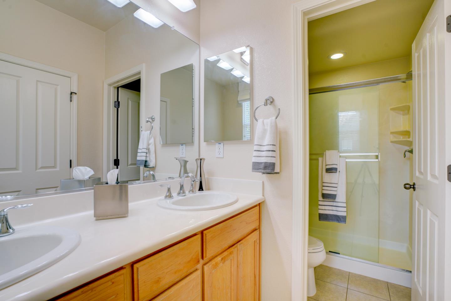 5236 Fioli Loop San Ramon, CA 94582 - Photo 27 of 40 a bathroom with a sink and a mirror