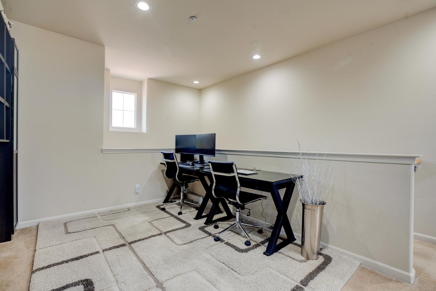5236 Fioli Loop San Ramon, CA 94582 - Photo 31 of 40 a view of a workspace with furniture and a window