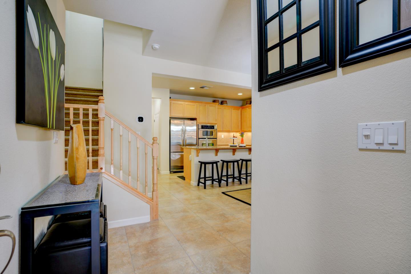 5236 Fioli Loop San Ramon, CA 94582 - Photo 4 of 40 a view of a hallway with a dining table & chairs