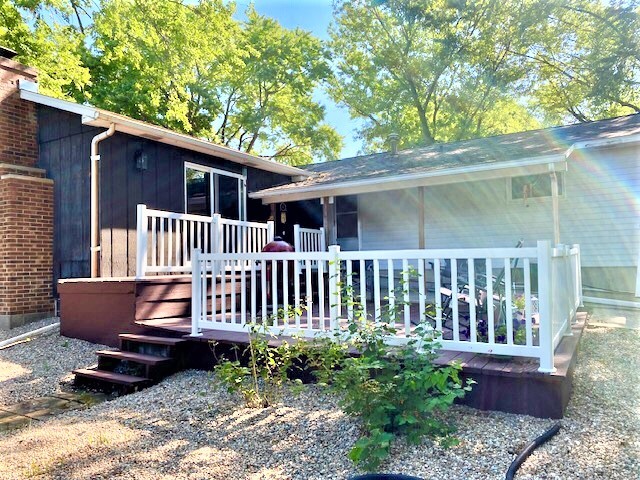 1817 6th Avenue Sterling, IL 61081 - Photo 4 of 16 a view of a wooden bench in back yard of a house
