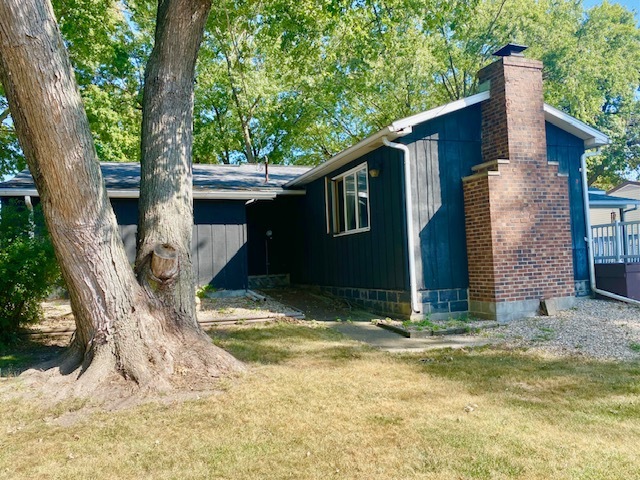 1817 6th Avenue Sterling, IL 61081 - Photo 5 of 16 a view of backyard with large tree