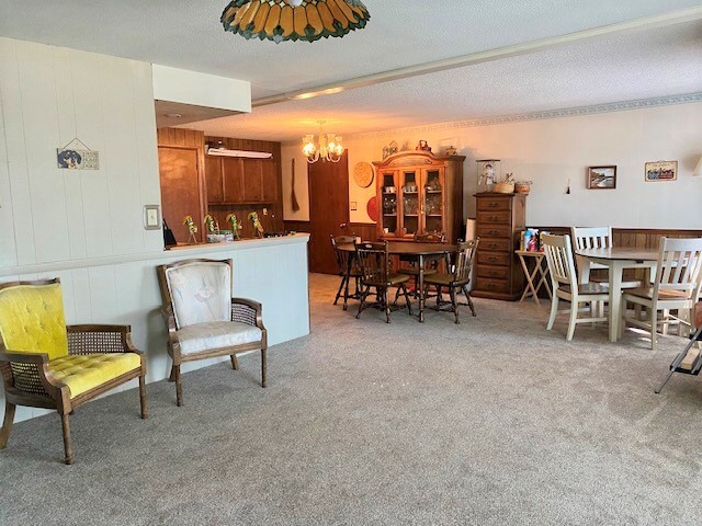 1817 6th Avenue Sterling, IL 61081 - Photo 9 of 16 a dining room with furniture and a table