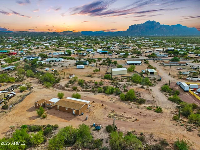 an aerial view of residential house and green space