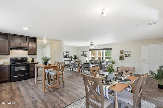 a view of a dining room with furniture
