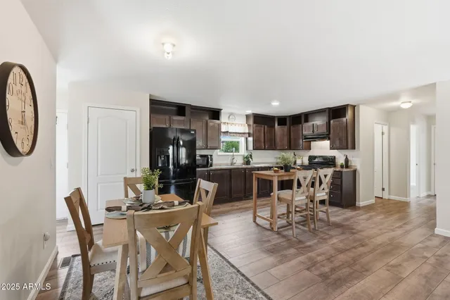 a view of a dining room with furniture