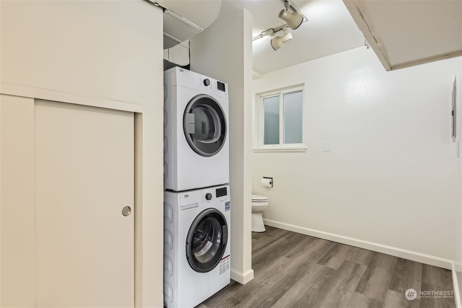 8536 Nesbit Avenue North, Unit A Seattle, WA 98103 - Photo 11 of 32 a utility room with dryer and washer