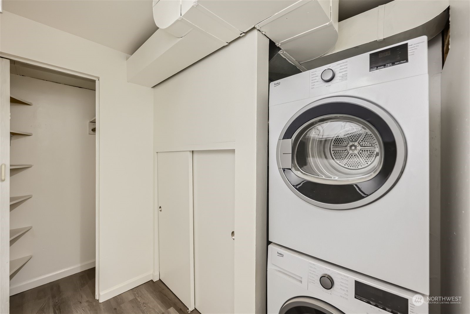 8536 Nesbit Avenue North, Unit A Seattle, WA 98103 - Photo 13 of 32 a utility room with dryer and washer